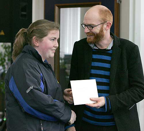 Gráinne Horan receiving her prize from Paul Young of the ‘Cartoon Saloon’