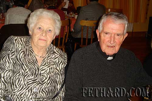 Photographed at Fethard Bridge Club Christmas Party are L to R: Bridie Lee and Fr. John Meagher OSA.