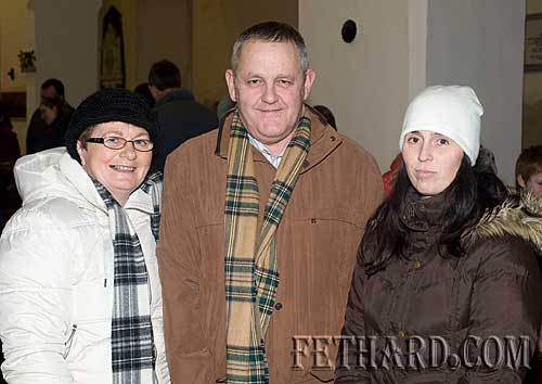 Photographed at the Annual Carol Service at Holy Trinity Church are L to R: Judy Doyle, Sean Doyle and Mia Treacy.