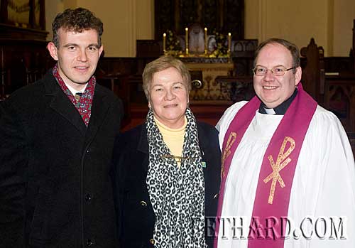 Photographed at the Annual Carol Service at Holy Trinity Church are L to R: Dr. David Butler, Peig Butler and Rev James Mulhall