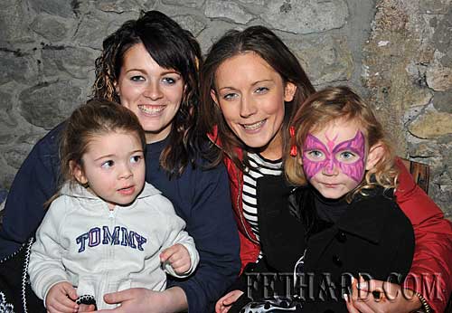 Photographed at the Christmas Party at The Castle Inn are L to R: Rebecca Ryan holding baby Chloe Ryan, and Samantha Brennan holding baby Alisha Brennan.