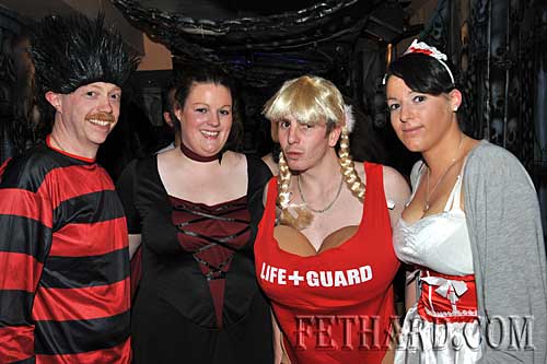 At the Halloween Party in Lonergans were L to R: Tom Behan, Mary Meagher, Eoin Maher and Alice Meagher.