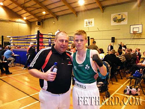 Jack after being presented with his Irish international jersey photographed with his coach Martin Fenness,y Clonmel Boxing Club.