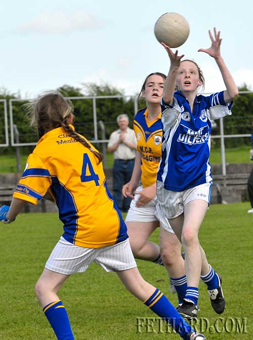 Annie Prout catches a high ball before scoring a point for Fethard