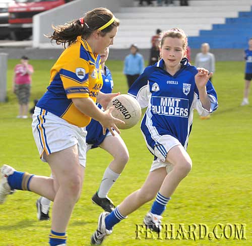 Fethard's Jessie McCarthy moves in to challenge for the ball.