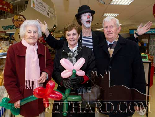 'Ken the Funny Man' photographed with L to R: Maureen O'Brien, Mary Woodlock and Pat Woodlock from Fethard at Superquinns 50th Birthday in Ireland celebrations.