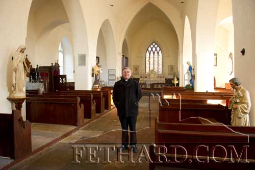 Fr. Tom Breen P.P. having a look at the 'transformed' Holy Trinity Church of Ireland for 'Stella Days'