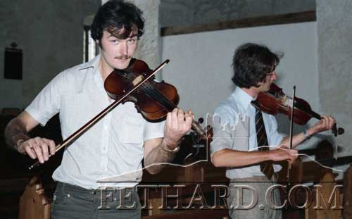 John Shortall and Phil Shee playing fiddle in the late 1970s. The Thatch pub in Cloneen was the regular venue for music at that time. One of the photographs received for this year's Emigrant's Newsletter.