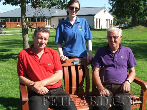 Michael O'Meara, Louise Lalor and Billy Phelan photographed at the new memorial seat on the 1st tee at Slievenamon Golf Club. The Phelan family donated the seat to the club on the 10th anniversary of Billy's sons, John and David, who tragically died shortly after 8pm on Sunday, August 4, 2002, following a road accident at Market Hill.