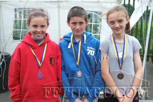 L to R: Leah Coen, Ben Coen and Alison Connolly all won silver medals at the Community Games County Athletic Finals in Templemore