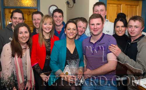 Kelly Anne Nevin photographed with friends and supporters after she was awarded the Butler's Bar 'Sports Achievement Award' for March at a special function on Friday, April 5, in Fethard.
