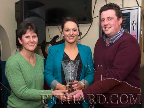 Kelly Anne Nevin, Ballintemple, Fethard receiving the Butlers Bar's 'Sports Achievement Award' for March from Barry O’Connor, Accounting & Bookkeeping Service Clonmel (sponsors) and special guest, Bobbi Holohan (left).