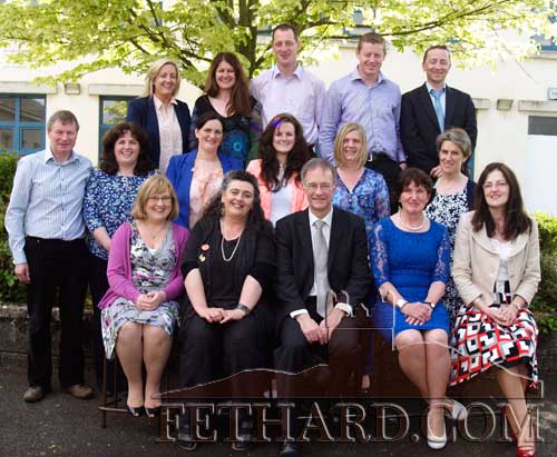 Ernan Britton photographed with staff members on the ocassion of his retirement