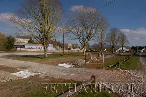 Fethard Playground site showing new pathway under construction inside railing on Cashel Road
