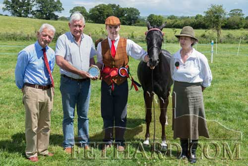 'Goldengrove Skyfall' winner of Champion of Champions at Killusty Show, owned by William and Aidan Williamson, and sponsored by AIB Fethard, L to R: Pat Culligan (Killustyy Show), John Palmer (AIB Fethard), Aidan Williamson and Mrs Rachael Bennett Hamilton Judge