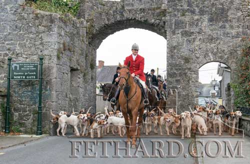 Derry Donegan leading the Tipperary Foxhounds through Fethard's North Gate at their Opening Meet