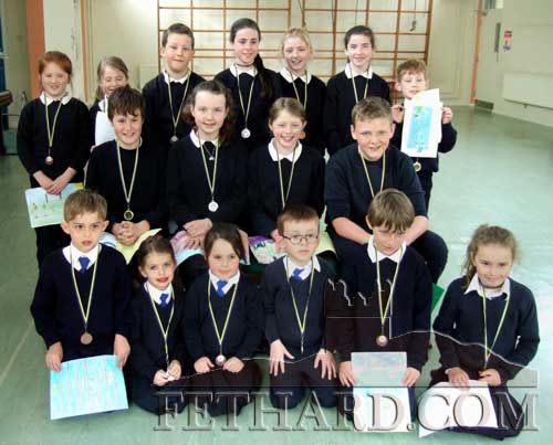Young artists from Holy Trinity National School Fethard who won medals at the Community Games Art Competition. Back L to R: Holly Hayes, Aoife Harrington, Conor Neville, Laura Harrington, Lily O’Mahony, Aine Ryan, Rory O’Mahony. Middle L to R: Ciaran Maguire, Eimear O’Sullivan, Jennifer Phelan (representing Powerstown-Lisronagh area), Matthew Burke. Front L to R: Sami Laaksonen, Lauren Connolly, Meadbh Collum, Oisín McAndrew, Michael Walsh and Kiera Daniel.