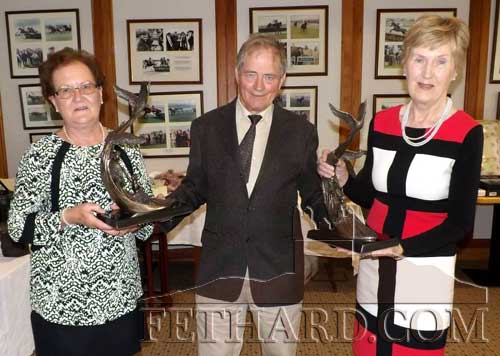 Club President, David O'Meara, presenting the President's Prize to winners Nora Ryan (left) and Gabrielle Schofield.