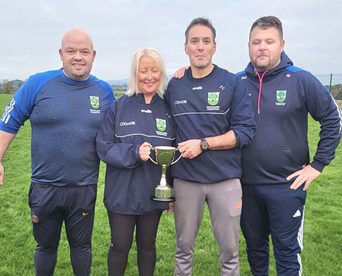 Fethard Ladies U16 team mentors and selectors with the cup L to R: Brian Egan, Lorraine Collum, Ed Collum, and Martin Boland.