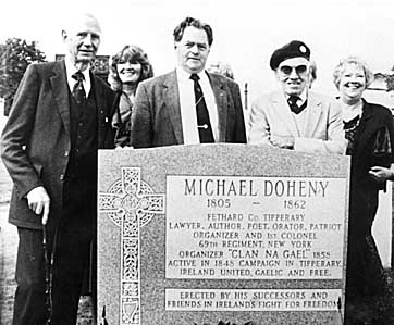 On Sunday December 4, 1988, Mrs. Mary Healy, on behalf of the Fethard Historical Society, unveiled a plaque commemorating Michael Doheny at his birthplace in Brookhill. A lecture on the “Young Ireland Rising 1848” by Dr. Willie Nolan took place afterwards in the Abymill Theatre. Ensuing coverage in the Nationalist led to an enquiry for further information on Michael Doheny from the New York Tipperary-men’s N & B Association, who erected a monument to him on 7th October 1989 at his previously unmarked burial place in First Calvary Cemetery, Section 4, Laurel Hill Boulevard, Woodside, New York. Pictured above at the unveiling are: Michael Flannery, Helen Doheny-Smith, Jim Grogan, Cashel, Paddy Doheny and Patricia Doheny.
