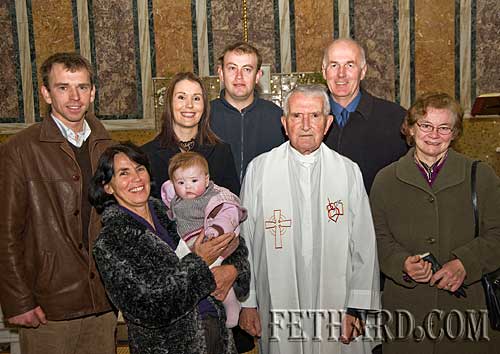 Photographed at Fr.  John Meagher's celebration of 70 years of Priesthood are Back L to R: Barry Grace, Maria Grace, John Fogarty, Seamus Kennedy. Front L to R: Anne Kennedy, Lauren Grace, Fr. John Meagher OSA, and Madge Fogarty