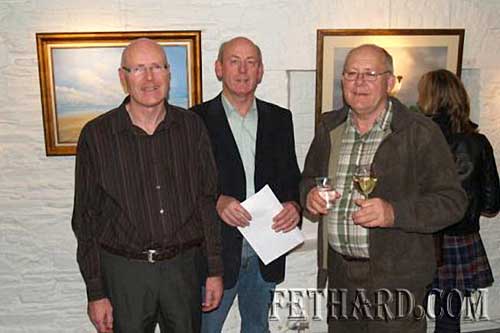 Joe Fogarty (left) photographed with his brothers John and Jim (right) at the Granary Gallery in Waterford