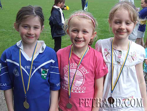 Winners in the Girls U8 60m race at Fethard Area Sports L to R: Lucy Spillane (gold), Anika O'Connor (silver) and Laura Kiely (gold).