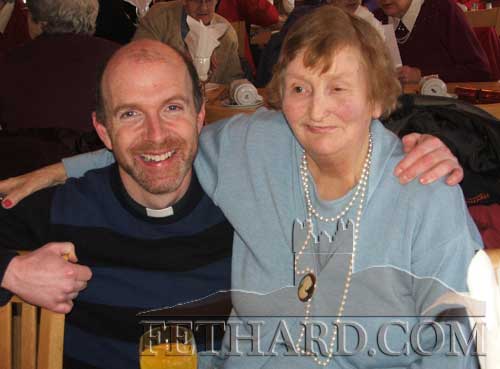 Photographed at Fethard & District Day Care Centre Christmas Party are L to R: Fr. McSweeney and Margaret Grant