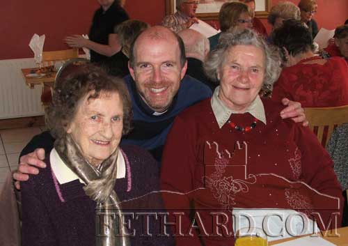 Photographed at Fethard & District Day Care Centre Christmas Party are L to R: Leisha Fogarty, Fr. McSweeney and Joan Heffernan