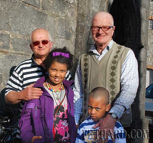 Johnny Burke (left) and Denis Burke with his grandchildren Eboni and Kiefer Burke at the Corpus Christi Procession last Sunday 6th June  in Fethard