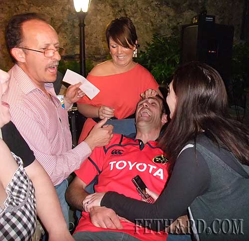 Noel Sharpe, proprietor of The Castle Inn, administering some painful 'leg waxing' at a special fundraiser in support of South Tipperary Hospice