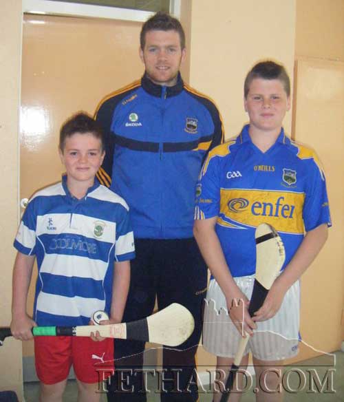 Jesse and Ross McCormack pictured with Padraig Maher, VHI Cul Camp ambassador 2011, at the launch of VHI Cul Camp in Holy Trinity NS on Thursday last.