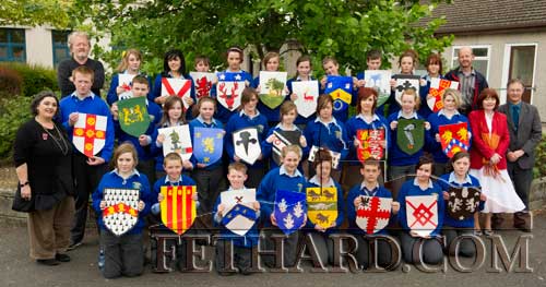Pupils of Fethard Patrician Presentation Secondary School photographed with their family shields produced with art teacher, Pat Looby, as part of their preparations for this year's Medieval Festival which takes place in Fethard on Sunday, August 21. Included are Terry Cunningham, Colm McGrath (chairman Fethatd Historical Society), Mary Hanrahan, Pat Looby (art teacher) and Ernan Britton (principal Patrician Presentation Secondary School).