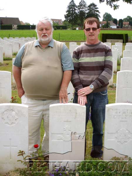 Brendan Kenny and John Neagle photographed at the grave of Pte Michael Curran (26028) aged 21 of the Royal Dublin Fusiliers who died on the 9th September, 1916, at the end of the Battle of the Somme. Michael was the son of Thomas and Kate Curran of Watergate Street, Fethard. He was the sixth of seven children. Before the war he worked as a kennel assistant with a Harry Turner, Peppardstown, Fethard. Michael's grave is in Delville Wood Cemetery, France