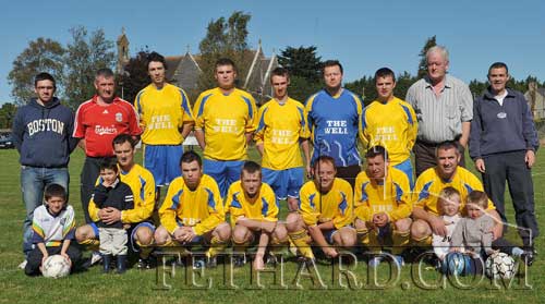 Killusty soccer team who won promotion to the 2nd Division League. Back L to R: Colm Coen, Shay Coen, Aaron Kelly, Noel Walsh, David Conway, Ronan Maher, Adrian Lawrence, Mick Smyth (The Well Bar), George Williams (Manager). Front L to R: Ben Coen, Danny Shelly, Tony Shelly, Shane Aylward, Andrew Aylward, Ross Aylward, Dean Tobin, Martin Coen holding Matt Coen and Jake Coen.