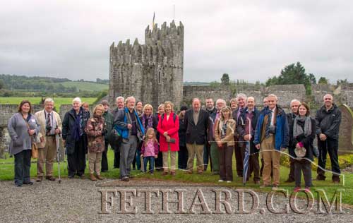 Participants in the 'Butler Trail' visit to Fethard photographed in the grounds of Holy Trinity Church of Ireland with guide Terry Cunningham.