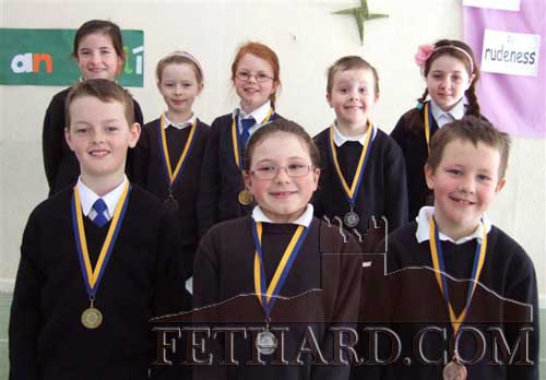 Local area Community Games Handwriting medal winners. Back L to R: Aine Ryan, Hannah Sheehy, Anna Collier, Mark Neville, Kayleigh Nevin. Front L to R: Keenan Ahearn, Gillian Burke and Conor Neville.
