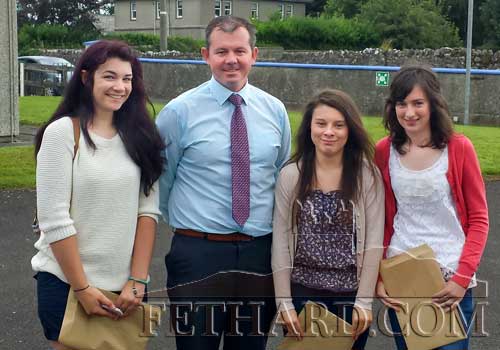 Mr Michael O'Sullivan, Principal Patrician Presentation Secondary School, photographed with  leaving Cert students after receiving their results. L to R: Tara Horan, Mr. Michael O'Sullivan (Principal), Danielle Sheehan and Michelle Walsh.