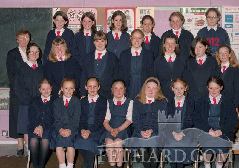 Nano Nagle Primary School sixth class, Fethard, taken November 1998. Back L to R: Sr. Mary (teacher), Helen Frewen, Rosanne Meaney, Lucy O’Hara, Susie Harvey, Emma O’Connell, Sarah Costello. Middle Row L to R: Tracey Lawrence, Danielle Lawrence, Mary Gorey, Ruth Corcoran, Linda Kenny, Susan Sayers, Stacey Grace. Front L to R: Evelyn Fogarty, Amy Quigley, Vicky Dorney, Kathleen Cawley, Tracey Coady, Siobhán Prout, and Melissa Rochford.