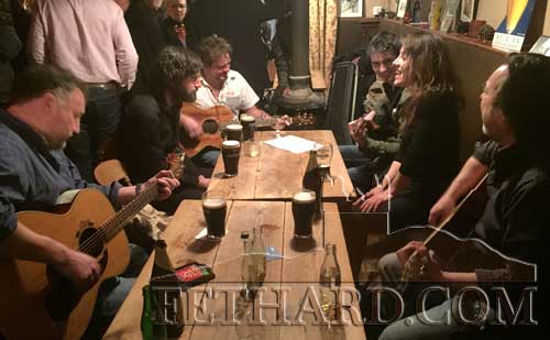 Aidan Ward's musician friends from far and photographed at an impromptu session in McCarthys after his removal to Fethard Parish Church on Thursday, January 1, 2015.