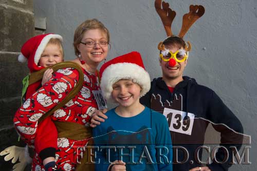 Taking part in the Fethard Santa Run were L to R: baby Mackenzie, Samantha, Kian and Toby Fernihough, Main Street, Fethard.