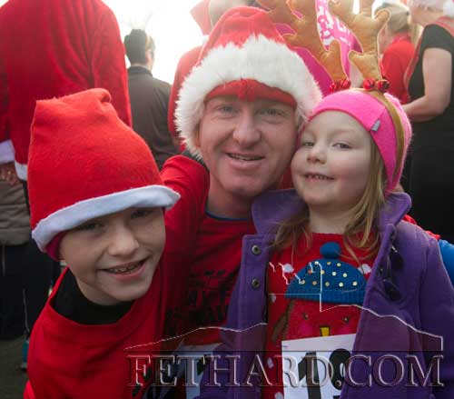 Taking part in the Fethard Santa Run were L to R: Paddy Ryan, Michael 'Magic' Ryan and Milly Ryan.