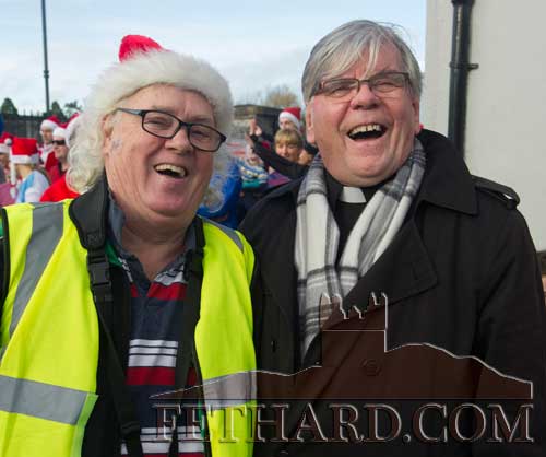 Organiser, Miceál McCormack and Canon Tom Breen P.P. sharing a joke at the start of the Santa Run in Fethard.