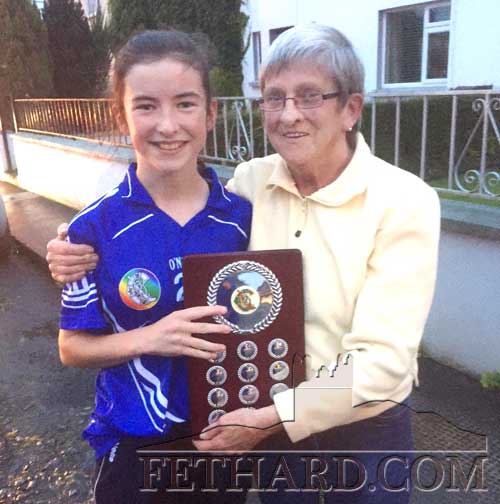 

Fethard U13 Camogie team captain, Àine Ryan, photographed with the President of St. Rita’s Camogie club, Tossie Lawton. Tossie, neé Carroll, played with St. Rita’s in the 1950s and 1960s.