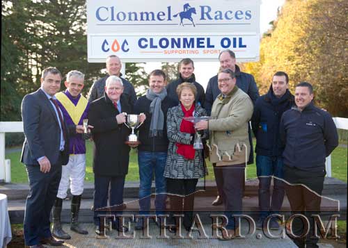 Sean and Teresa Connolly present the Clonmel Oil Cup and trophy to Luke McMahon and friends following the victory of the Willie Mullins trained Alelchi Inois in an exciting renewal of the Clonmel Oil Steeplechase at Clonmel Races on November 17. Eamon McEvoy from Topaz makes a presentation to winning jockey Ruby Walsh and also in photo are Brian Connolly and Declan Brown from Clonmel Oil.