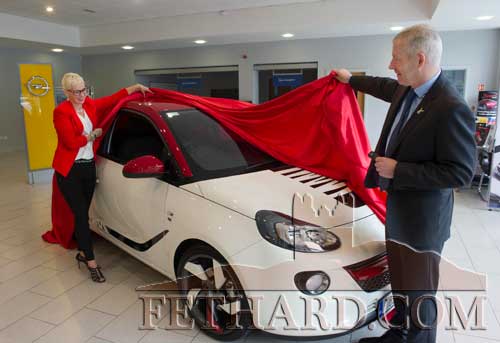 Sue Anne O’Donnell, Coleman, Fethard, unveiling her specially designed Opel Adam ‘TTYL GONE for a Cuppa’, in memory of her late son Adam, with Willie Butler, General Manager, Kevin O’Leary Group, Clonmel.