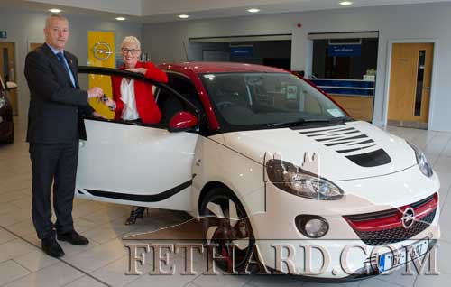 Sue Anne O’Donnell receiving the keys of her specially designed Opel Adam ‘TTYL GONE for a Cuppa’, from Willie Butler, General Manager, Kevin O’Leary Group, Clonmel.