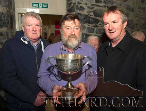 Noel Byrne (centre) who brought along the GAA 'D.P. Walsh Perpetual Cup' to the lecture. The cup is presented to the winners of the County Tipperary Junior ‘A’ Hurling Championship, and Noel is photographed with two of D.P. Walsh's Fethard relatives, Rory Walsh (left) and Derek Walsh.