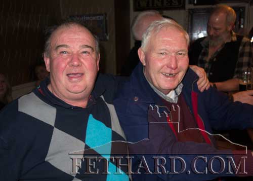 Enjoying New Year's Eve in Lonergan's Bar were L to R: Noel Blake and Michael Purcell.