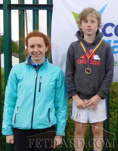 Noah Oâ€™Flynn, Knockelly won a silver medal at community games county athletic finals for the second successive year pictured with Ciara Cummins.